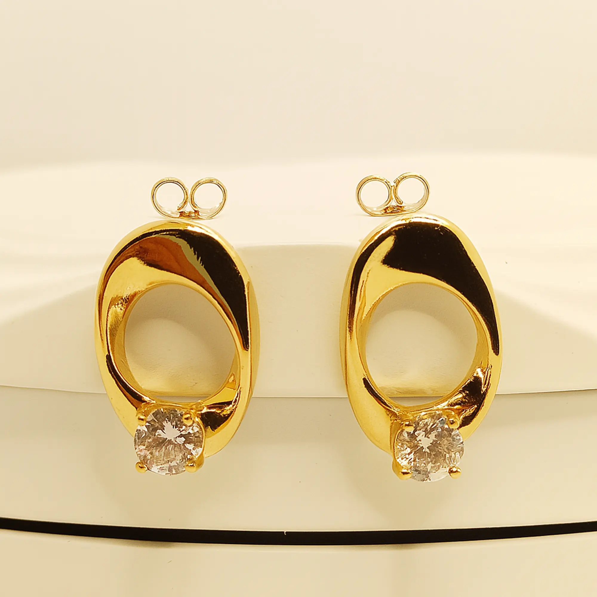 Floating Crystal Oval Studs - Hover