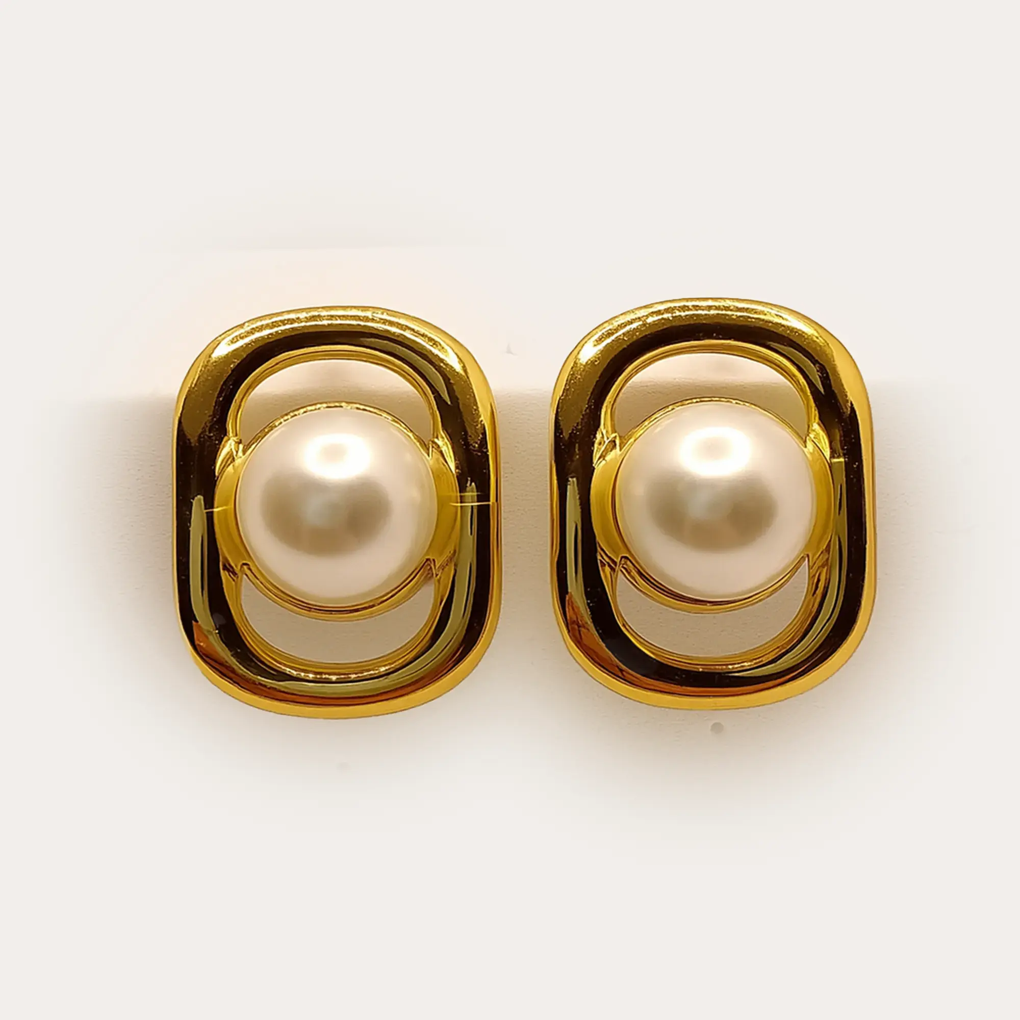 Golden Pearl Encasement Studs